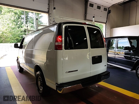 2020 Chevrolet Express Cargo with VIN 1GCWGAFG0L1185522, listed as a IAAI auction lot 42842195 with 128,884 mi miles and . Bid and sale history available at DreamBid. Image 2.