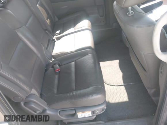 2012 Honda Odyssey EX-L with VIN 5FNRL5H61CB095789, listed as a IAAI auction lot 42065507 with 138,570 mi miles and . Bid and sale history available at DreamBid. Image 8.