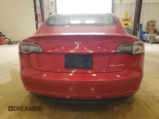 2022 Tesla Model 3 Long Range with VIN 5YJ3E1EBXNF285779, listed as a Copart auction lot 54630135 with 129,097 mi miles and Clean Title. Bid and sale history available at DreamBid. Image 6.