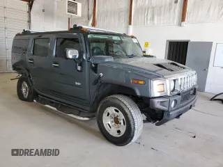 2005 Hummer H2 SUV z VIN 5GRGN23U65H127711, wystawiony jako Copart lot #53180865 z przebiegiem 178 085 mil mil oraz Szkody całkowita. Historia ofert i sprzedaży dostępna na DreamBid. Obrazek 4.