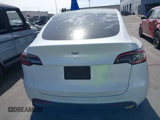 2021 Tesla Model Y Long Range with VIN 5YJYGDEE3MF081304, listed as a IAAI auction lot 41706240 with 90,510 mi miles and . Bid and sale history available at DreamBid. Image 16.