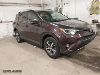 2017 Toyota RAV4 XLE with VIN 2T3RFREV3HW679851, listed as a IAAI auction lot 41708097 with 128,482 mi miles. Bid and sale history available at carsss.com. Image 1.