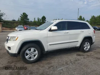 2011 Jeep Grand Cherokee Laredo with VIN 1J4RR4GG2BC581987, listed as a Copart auction lot 64072515 with 213,607 mi miles and Clean title. Bid and sale history available at DreamBid. Image 1.