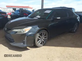 2014 Scion tC z VIN JTKJF5C75E3069757, wystawiony jako IAAI lot #42175725 z przebiegiem 191 054 mil mil oraz . Historia ofert i sprzedaży dostępna na DreamBid. Obrazek 16.