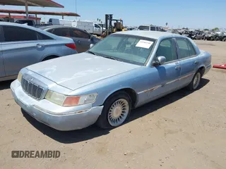 2000 Mercury Grand Marquis LS z VIN 2MEFM75W8YX660478, wystawiony jako IAAI lot #42289748 z przebiegiem 237 860 mil mil oraz . Historia ofert i sprzedaży dostępna na DreamBid. Obrazek 2.