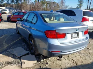 2013 BMW 3 Series 320i with VIN WBA3B1C56DK128321, listed as a IAAI auction lot 41347216 with 91,906 mi miles. Bid and sale history available at carsss.com. Image 3.