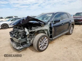 2023 Mazda CX-9 Carbon Edition with VIN JM3TCBDY1P0633964, listed as a Copart auction lot 60750015 with 34,657 mi miles and Salvage title. Bid and sale history available at DreamBid. Image 1.