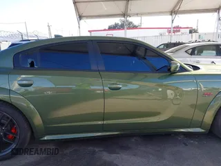 2022 Dodge Charger Scat Pack Widebody with VIN 2C3CDXGJ1NH216763, listed as a IAAI auction lot 41259159 with 32,610 mi miles and . Bid and sale history available at DreamBid. Image 13.