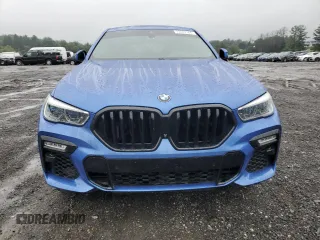 2020 BMW X6 M50i with VIN 5UXCY8C07L9B45473, listed as a Copart auction lot 73403164 with 0 mi miles and Salvage Title. Bid and sale history available at carsss.com. Image 5.