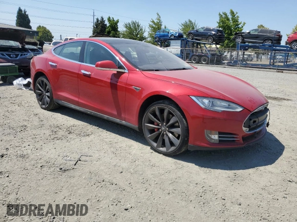 2014 Tesla Model S 60 with VIN 5YJSA1H17EFP29100, listed as a Copart auction lot 65081725 with 130,377 mi miles and Clean title. Bid and sale history available at DreamBid. Image 4.