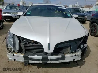 2014 Lincoln MKS with VIN 1LNHL9EK0EG609236, listed as a Copart auction lot 75507444 with 80,203 mi miles and Salvage Title. Bid and sale history available at carsss.com. Image 12.