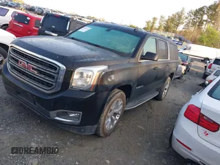2016 GMC Yukon XL SLE with VIN 1GKS1FKC6GR140418, listed as a IAAI auction lot 41843064 with 155,472 mi miles. Bid and sale history available at carsss.com. Image 17.