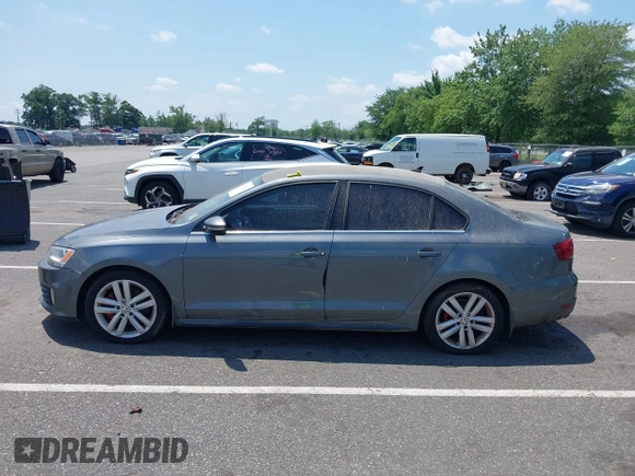 2014 Volkswagen Jetta GLI Autobahn with VIN 3VW5T7AJ6EM201416, listed as a IAAI auction lot 42684207 with 164,905 mi miles and . Bid and sale history available at DreamBid. Image 14.