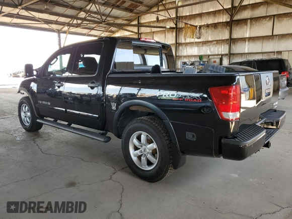 2011 Nissan Titan Pro-4X z VIN 1N6BA0EC9BN304469, wystawiony jako Copart lot #52982815 z przebiegiem 108 829 mil mil oraz Szkoda całkowita • Salvage title. Historia ofert i sprzedaży dostępna na DreamBid. Obrazek 2.