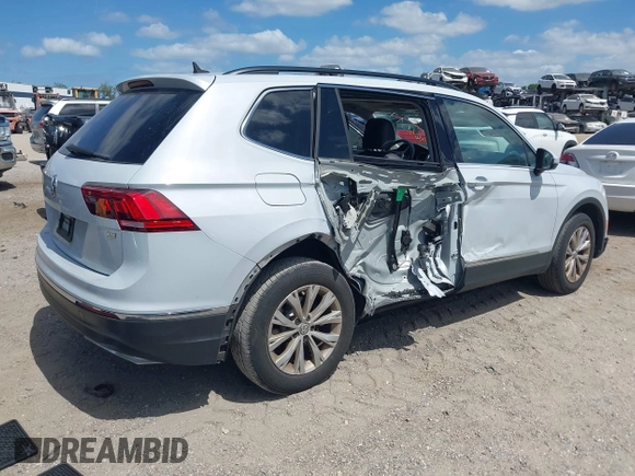 2018 Volkswagen Tiguan SEL with VIN 3VV3B7AX5JM053045, listed as a IAAI auction lot 41963017 with 77,495 mi miles and . Bid and sale history available at DreamBid. Image 4.