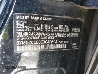 2014 BMW X6 M with VIN 5YMGZ0C50E0C40694, listed as a Copart auction lot 43943305 with 124,104 mi miles and Salvage Title. Bid and sale history available at carsss.com. Image 13.