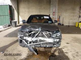 2021 BMW 3 Series 330i xDrive z VIN 3MW5R7J03M8B87133, wystawiony jako IAAI lot #42005842 z przebiegiem 28 668 mil mil oraz . Historia ofert i sprzedaży dostępna na DreamBid. Obrazek 13.
