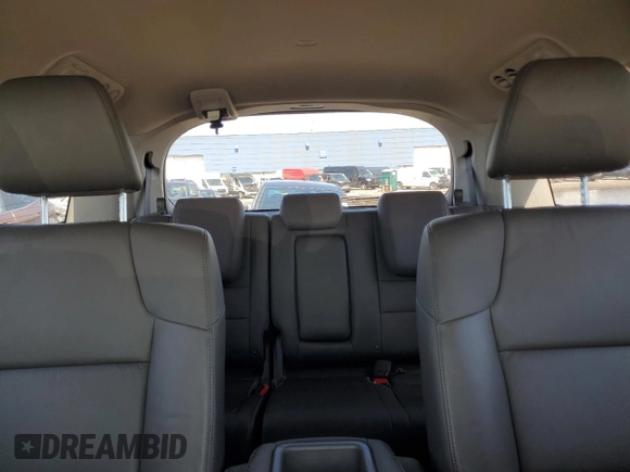 2012 Honda Odyssey Touring with VIN 5FNRL5H90CB093963, listed as a Copart auction lot 55434725 with 202,867 mi miles and Salvage Title. Bid and sale history available at DreamBid. Image 10.