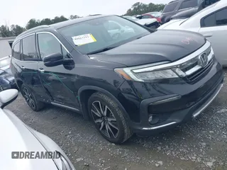 2019 Honda Pilot Touring 7-Passenger z VIN 5FNYF5H66KB027960, wystawiony jako IAAI lot #41863212 z przebiegiem 114 615 mil mil oraz . Historia ofert i sprzedaży dostępna na DreamBid. Obrazek 1.