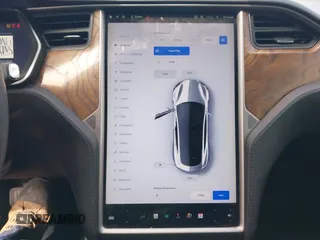 2018 Tesla Model S 75D with VIN 5YJSA1E23JF271465, listed as a IAAI auction lot 41911356 with 50,483 mi miles and . Bid and sale history available at DreamBid. Image 18.