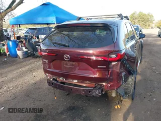 2024 Mazda CX-90 S Premium z VIN JM3KKDHC2R1101502, wystawiony jako IAAI lot #42114075 z przebiegiem 16 288 mil mil oraz . Historia ofert i sprzedaży dostępna na DreamBid. Obrazek 6.