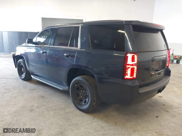 2017 Chevrolet Tahoe Commercial with VIN 1GNLCDECXHR228908, listed as a IAAI auction lot 41537030 with 114,725 mi miles. Bid and sale history available at carsss.com. Image 3.