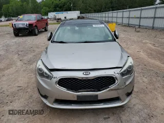 2014 Kia Cadenza Premium z VIN KNALN4D7XE5123003, wystawiony jako Copart lot #56565475 z przebiegiem 104 949 mil mil oraz Tytuł czysty. Historia ofert i sprzedaży dostępna na DreamBid. Obrazek 5.