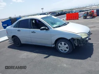 2007 Ford Focus S z VIN 1FAHP34NX7W163158, wystawiony jako IAAI lot #42586421 z przebiegiem 123 131 mil mil oraz . Historia ofert i sprzedaży dostępna na DreamBid. Obrazek 13.