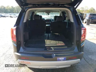 2023 GMC Acadia SLT with VIN 1GKKNMLS9PZ206975, listed as a Copart auction lot 88037685 with 12,465 mi miles and Salvage Title. Bid and sale history available at DreamBid. Image 6.