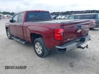 2015 Chevrolet Silverado 1500 LT with VIN 1GCRCREC6FZ151273, listed as a IAAI auction lot 40377068 with 264,496 mi miles. Bid and sale history available at carsss.com. Image 3.