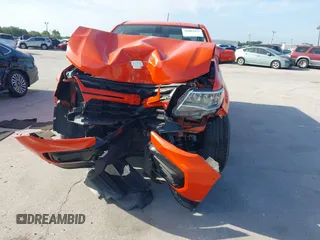 2021 Chevrolet Colorado 2WD Work Truck z VIN 1GCHSBEA9M1154037, wystawiony jako IAAI lot #42084993 z przebiegiem 41 710 mil mil oraz . Historia ofert i sprzedaży dostępna na DreamBid. Obrazek 13.