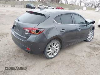 2014 Mazda 3 S Touring with VIN JM1BM1L30E1200337, listed as a IAAI auction lot 41906333 with 92,873 mi miles and . Bid and sale history available at DreamBid. Image 4.