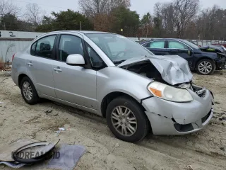 2012 Suzuki SX4 LE with VIN JS2YC5A39C6305357, listed as a Copart auction lot 84146324 with 163,097 mi miles and Salvage Title. Bid and sale history available at carsss.com. Image 4.