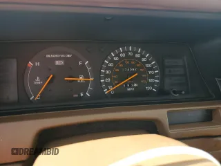 1991 Toyota Camry DLX z VIN 4T1SV21E5MU415356, wystawiony jako Copart lot #74465914 z przebiegiem 74 592 mil mil oraz Szkoda całkowita • Salvage title. Historia ofert i sprzedaży dostępna na DreamBid. Obrazek 9.