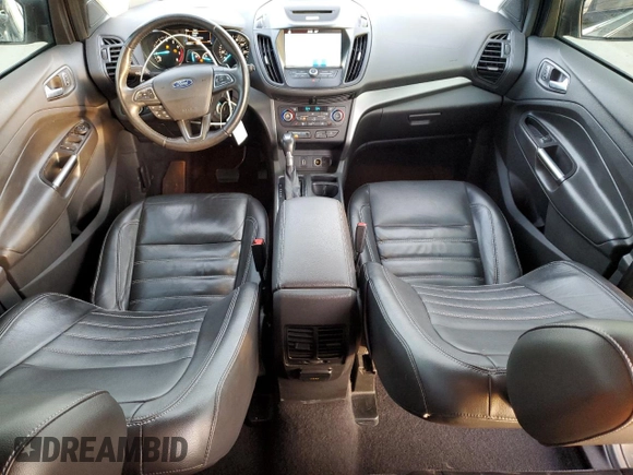 2017 Ford Escape SE with VIN 1FMCU0G91HUE07265, listed as a Copart auction lot 84231444 with 82,990 mi miles and Clean Title. Bid and sale history available at DreamBid. Image 8.