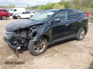 2018 Hyundai Santa Fe 2.4L z VIN 5NMZUDLB2JH058032, wystawiony jako IAAI lot #42206116 z przebiegiem 138 688 mil mil oraz . Historia ofert i sprzedaży dostępna na DreamBid. Obrazek 18.