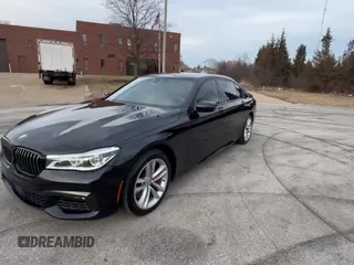 2017 BMW 7 Series ALPINA B7 xDrive с VIN WBA7F2C51HG421516, выставлен на аукционе Copart как лот 61215705 с пробегом 87 765 миль миль и Чистый • Clean title. История ставок и продаж доступна на DreamBid. Изображение 11.