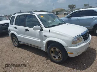 2002 Suzuki Grand Vitara JS z VIN JS3TE62VX24154819, wystawiony jako IAAI lot #42409780 z przebiegiem 160 545 mil mil oraz . Historia ofert i sprzedaży dostępna na DreamBid. Obrazek 1.