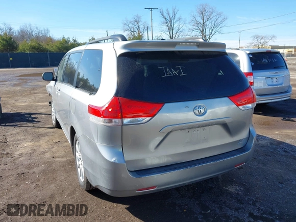 2012 Toyota Sienna XLE with VIN 5TDDK3DC6CS045009, listed as a IAAI auction lot 41790571 with 154,817 mi miles. Bid and sale history available at carsss.com. Image 3.