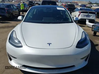 2023 Tesla Model 3 z VIN 5YJ3E1EA5PF401237, wystawiony jako IAAI lot #42520423 z przebiegiem 45 262 mil mil oraz . Historia ofert i sprzedaży dostępna na DreamBid. Obrazek 13.
