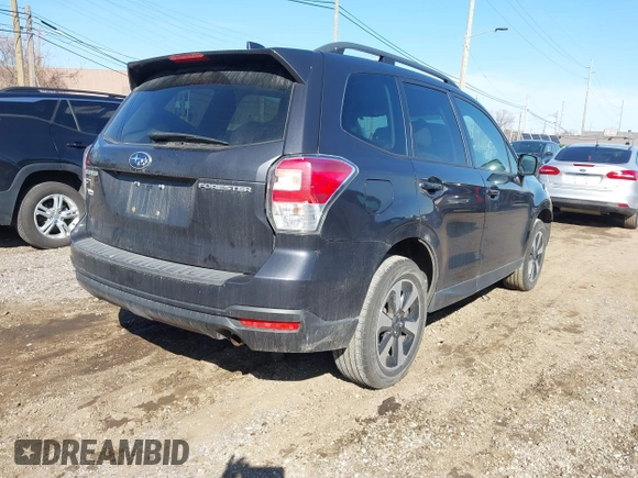 2018 Subaru Forester Premium with VIN JF2SJAEC9JH411903, listed as a IAAI auction lot 41844000 with 91,090 mi miles and . Bid and sale history available at DreamBid. Image 4.