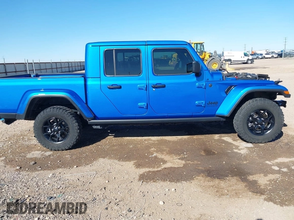 2024 Jeep Gladiator Willys with VIN 1C6HJTAG0RL123040, listed as a IAAI auction lot 41849222 with 14,989 mi miles and . Bid and sale history available at DreamBid. Image 14.