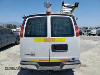 2014 Chevrolet Express Cargo Van with VIN 1GCWGFCB2E1122236, listed as a Copart auction lot 72826254 with 70,696 mi miles and Clean Title. Bid and sale history available at carsss.com. Image 6.