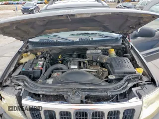 2003 Jeep Grand Cherokee Laredo with VIN 1J4GW48SX3C569087, listed as a Copart auction lot 55941035 with Not provided miles and Salvage title. Bid and sale history available at DreamBid. Image 12.