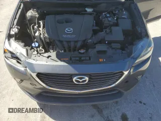 2017 Mazda CX-3 Touring z VIN JM1DKDC73H0172403, wystawiony jako Copart lot #47396355 z przebiegiem 79 865 mil mil oraz Szkoda całkowita • Salvage title. Historia ofert i sprzedaży dostępna na DreamBid. Obrazek 12.