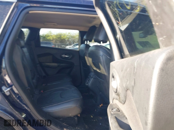 2015 Jeep Cherokee Latitude with VIN 1C4PJMCB1FW709560, listed as a IAAI auction lot 42035619 with 162,354 mi miles. Bid and sale history available at carsss.com. Image 8.