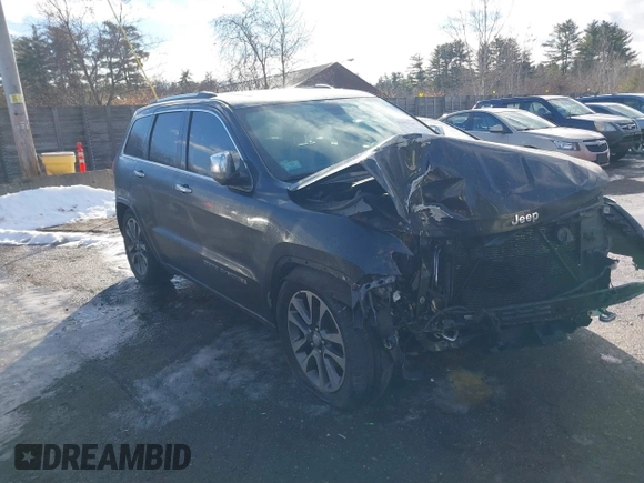 2017 Jeep Grand Cherokee Overland with VIN 1C4RJFCG8HC835645, listed as a IAAI auction lot 41442765 with 95,324 mi miles and . Bid and sale history available at DreamBid. Image 1.