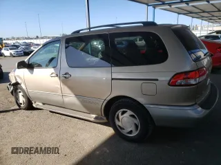 2002 Toyota Sienna LE with VIN 4T3ZF13C42U474033, listed as a Copart auction lot 45404675 with 186,920 mi miles and Salvage Title. Bid and sale history available at carsss.com. Image 2.