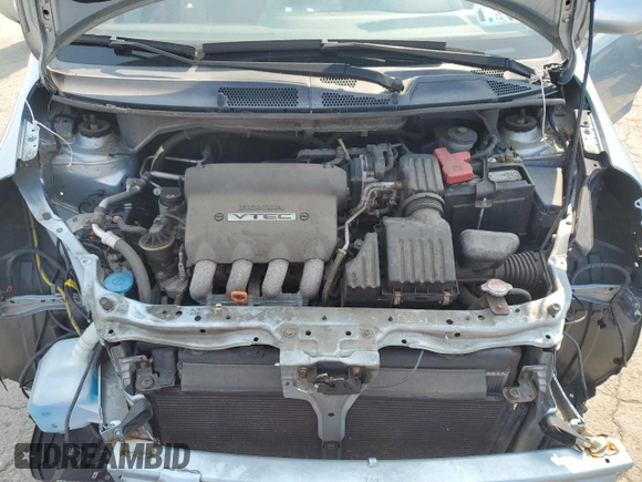 2007 Honda Fit z VIN JHMGD38487S045082, wystawiony jako Copart lot #59336665 z przebiegiem 73 754 mil mil oraz Szkoda całkowita • Salvage title. Historia ofert i sprzedaży dostępna na DreamBid. Obrazek 11.