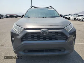 2020 Toyota RAV4 XLE with VIN 2T3W1RFV8LW070246, listed as a Copart auction lot 65072185 with 61,339 mi miles and Salvage title. Bid and sale history available at DreamBid. Image 5.